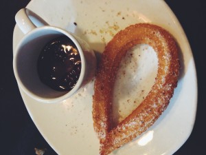 Churro with a shot of chocolate